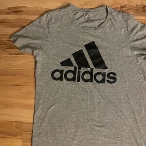 Adidas Tee shirt in men’s size medium.